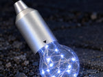 Smashproof Hanging Light intact on gravel